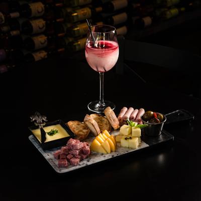 Charcuterie Board and a cocktail.
