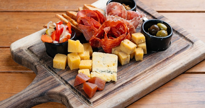 An angled view of a Craft Charcuterie Board