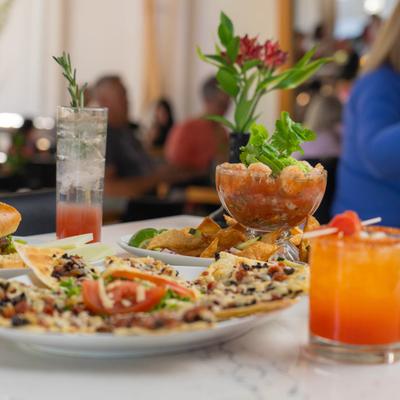Various food and drinks on the table.