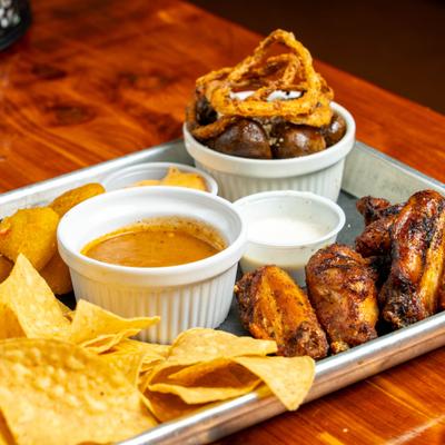 Sample platter, served on a tray, side view, closeup.