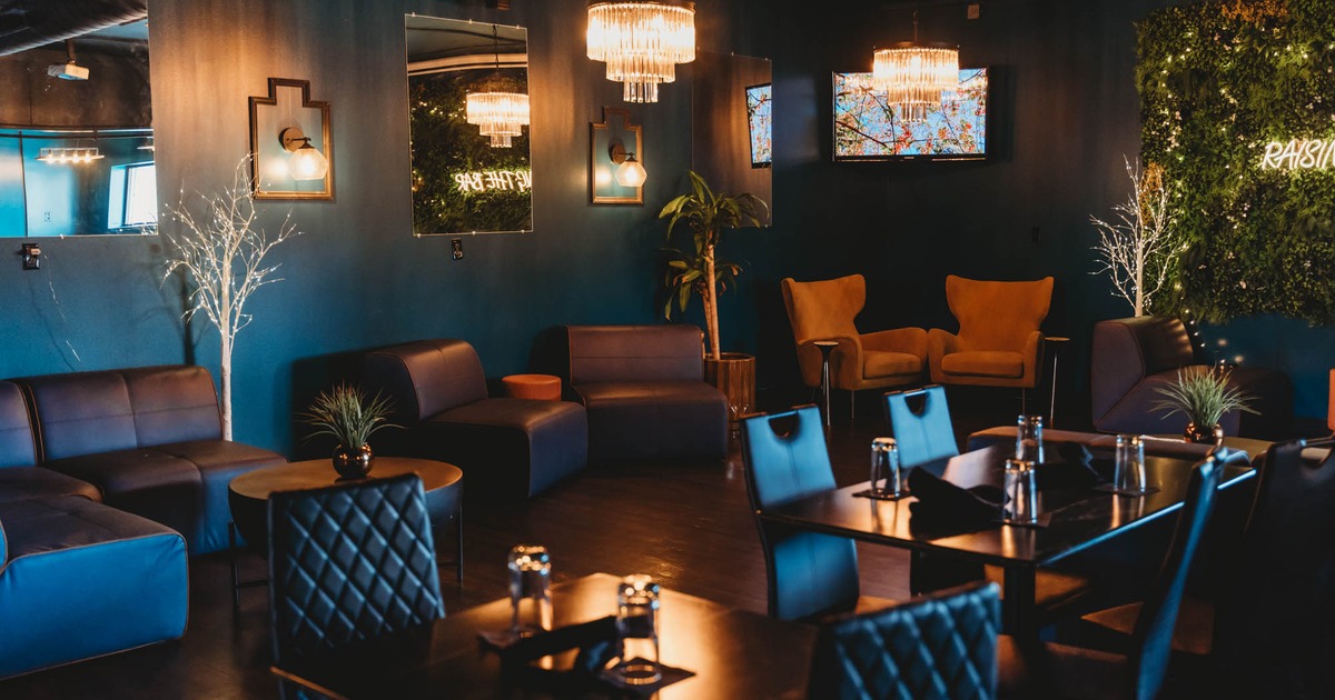 Interior, lounge and dining area, regular dining tables, armchairs and corner sofa