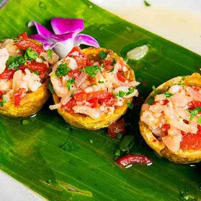 Served Tostones rellenos.