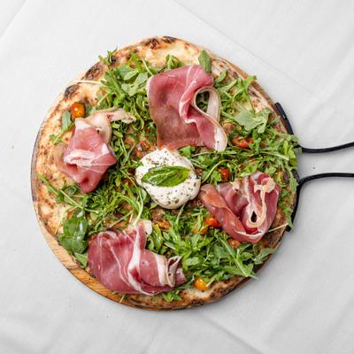 Prosciutto Crudo, rucola, burrata pizza.