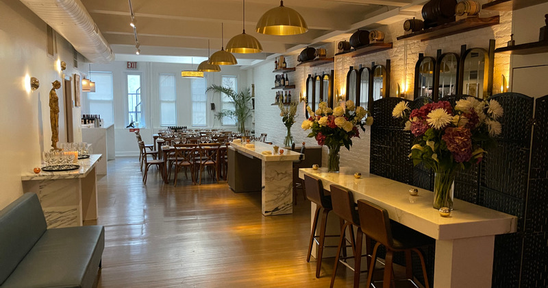 Interior, tables with with wine glasses on them