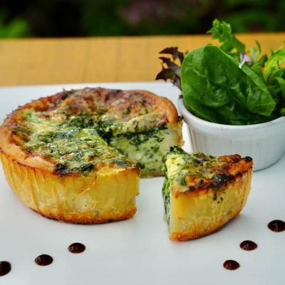 Spinach quiche with salad.
