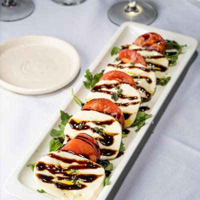 Caprese Salad, with mozzarella, tomatoes, basil, and balsamic.