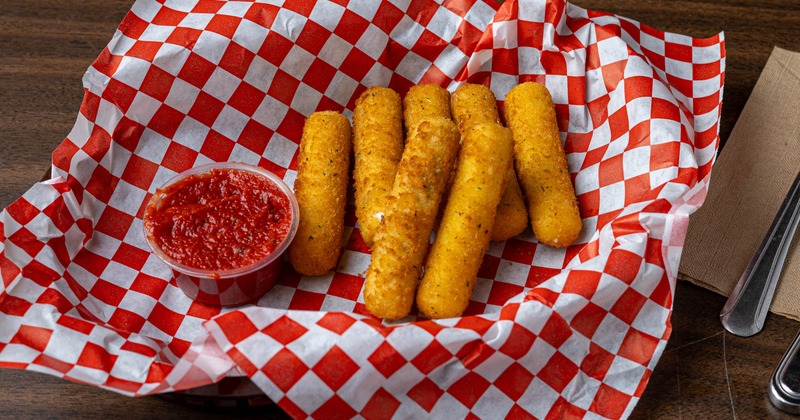Mozzarella Sticks served with a dipping sauce