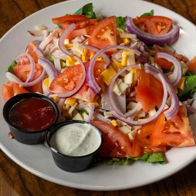Large Chef Salad with two side cups of dressing.