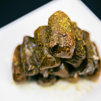 Rice rolled in grapevine leaves.