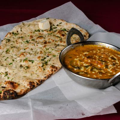 Vegetable curry and naan bread.