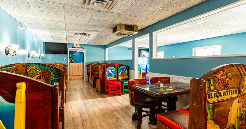 Interior, dining booths with painted images