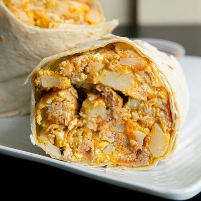 Burrito with pork, potatoes, egg, and cheese.