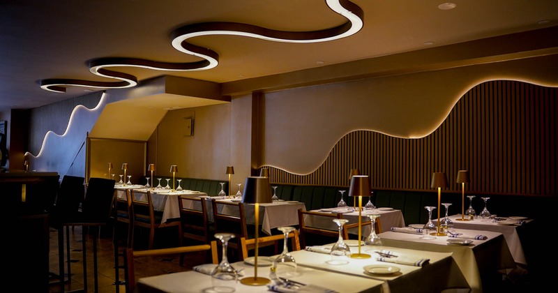 Interior, tables and chairs with tableware