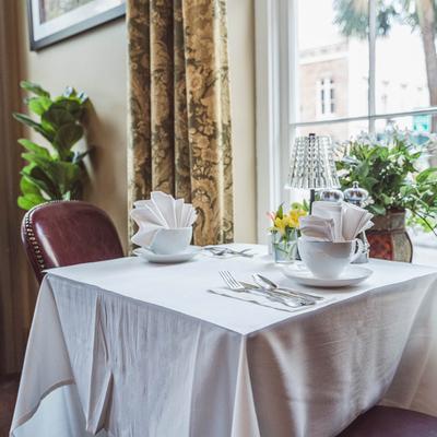 Dining table for two, next to the window.