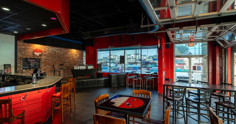 Interior, bar, diner tables, chairs, entrance