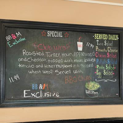 The specials board on the wall.