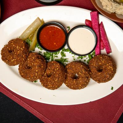 Falafel with dipping sauces.