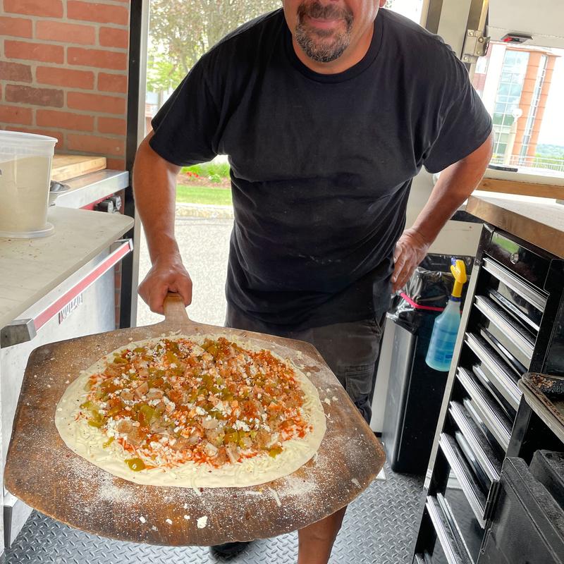 We bring the pizza — you enjoy the party! photo