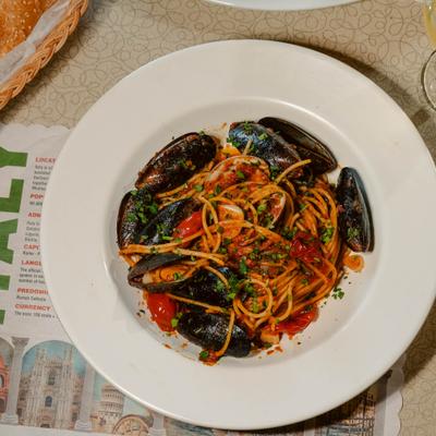 Linguine mussels with red sauce.