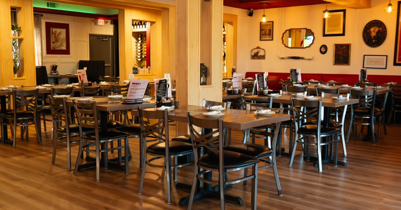 Interior, dining area, tables for four and six, ready for guests