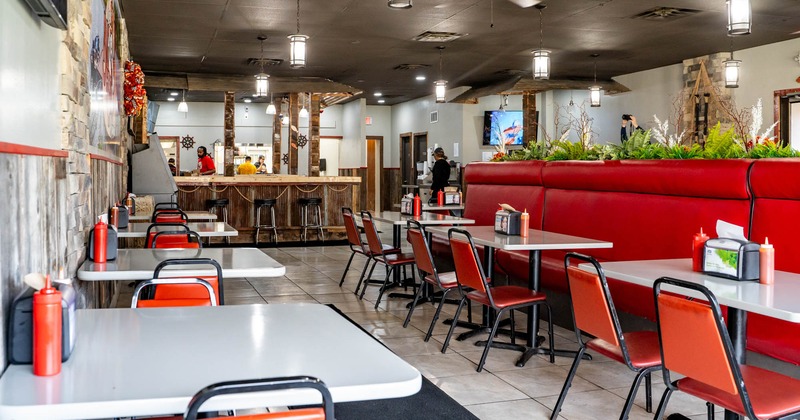 Interior, tables and chairs ready for guests