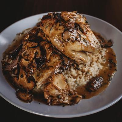 Chicken marsala served over rice.