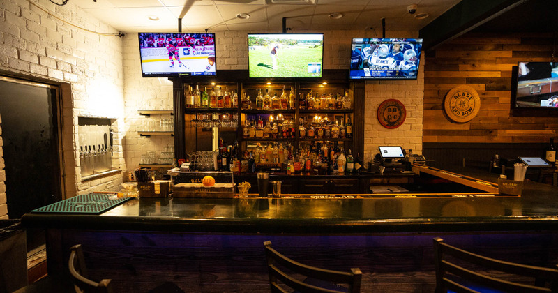 Interior, seating area with tall chairs