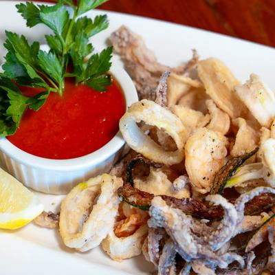 Deep fried calamari with shrimp, zucchini, and marinara.