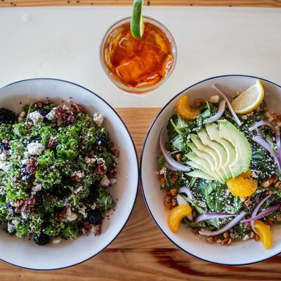 Quarter Lemon salad, Kale & Quinoa salad, and a cocktail.