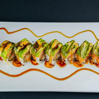 Shrimp tempura rolls, with cream cheese, avocado, spicy crab meat, and sauce.