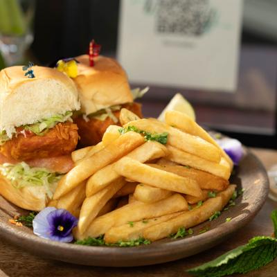 Irie Ting Fish Sliders served with sweet potato fries.