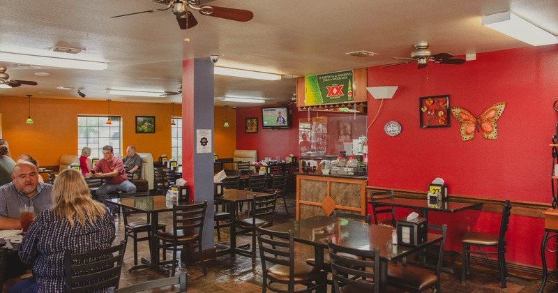 Interior, dining area with seated guests