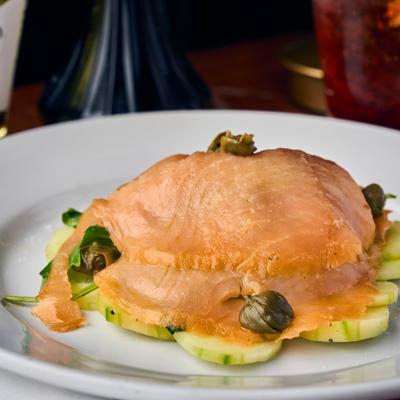 Smoked salmon with arugula and cucumbers.