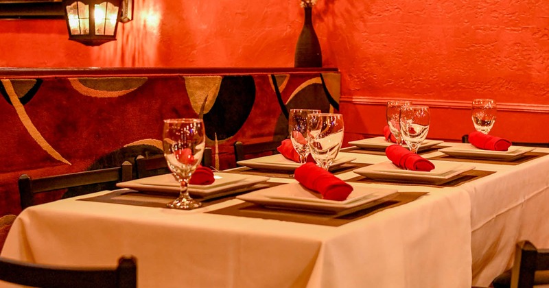 Inside, dining table ready for guests