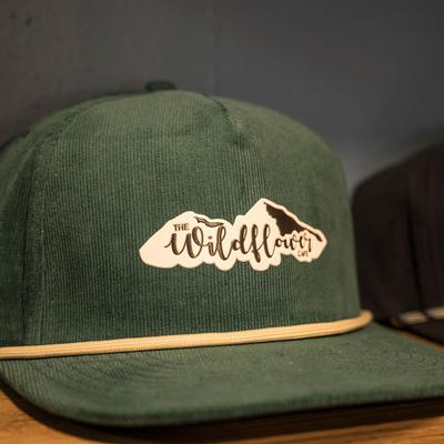 A hat with the restaurant's brand name.