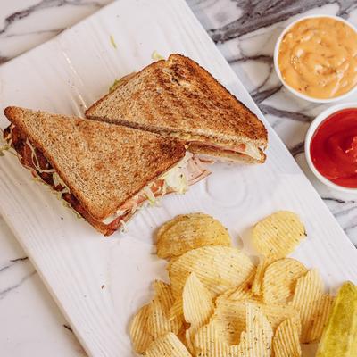 Grilled sandwiches and chips.