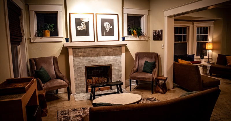 Lounging area, seating by the fireplace