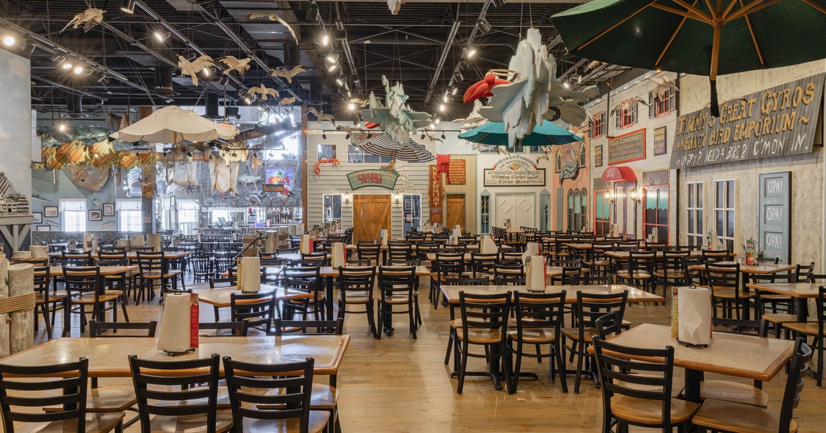 Interior, tables with chairs waiting for the guests