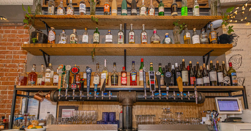 Interior, seating area, staff member working
