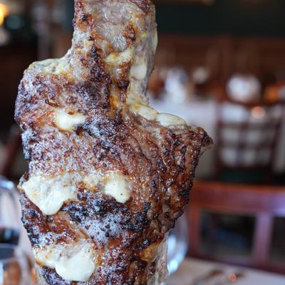 Meat grilling on a rotisserie.