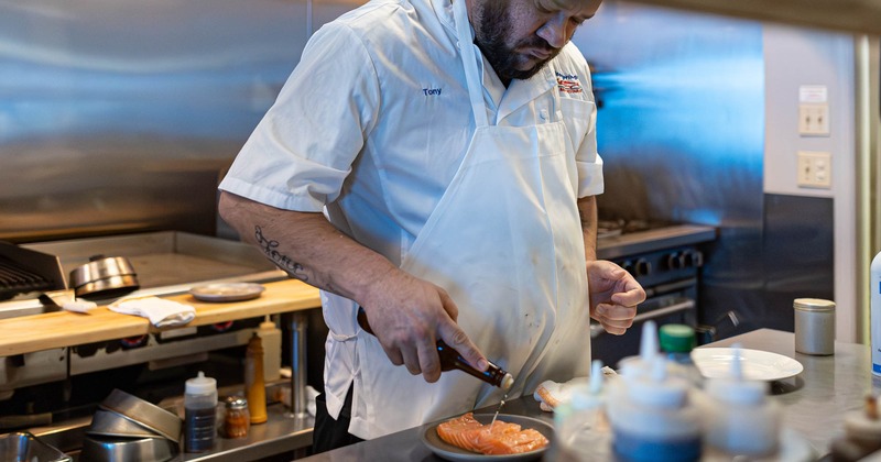 A kitchen employee in action