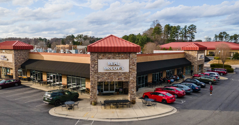 Exterior, restaurant building, seating area outside and parking space