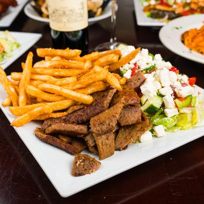 Gyro platter served with fries and salad.
