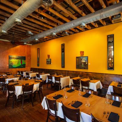 Interior, tables, chairs, wall decorations, ventilation system, glass doors