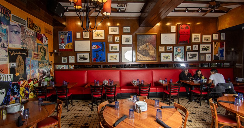 Interior, seating area with set dining tables