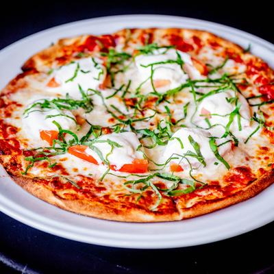 A whole margarita pizza.