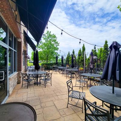 Patio tables and seats in daylight