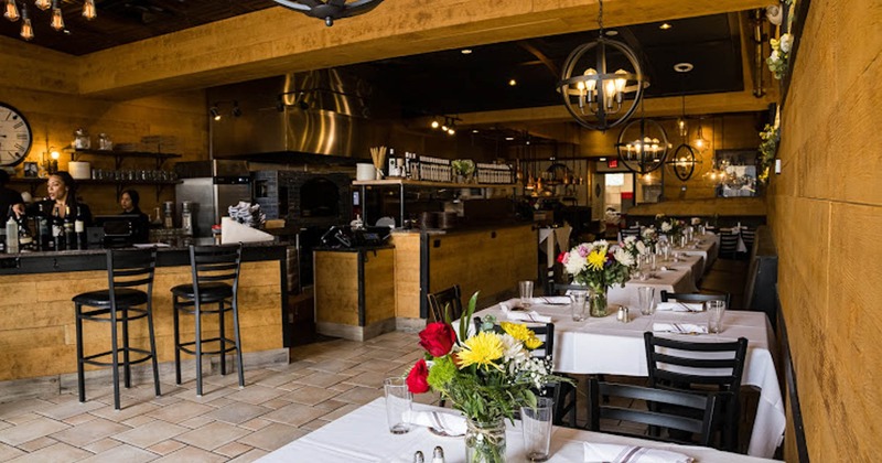 Interior, seating with bar and counter in the back