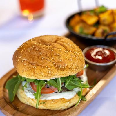 Burger on serving board