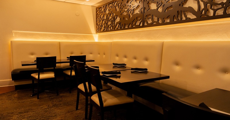 Cozy interior dining area with set tables